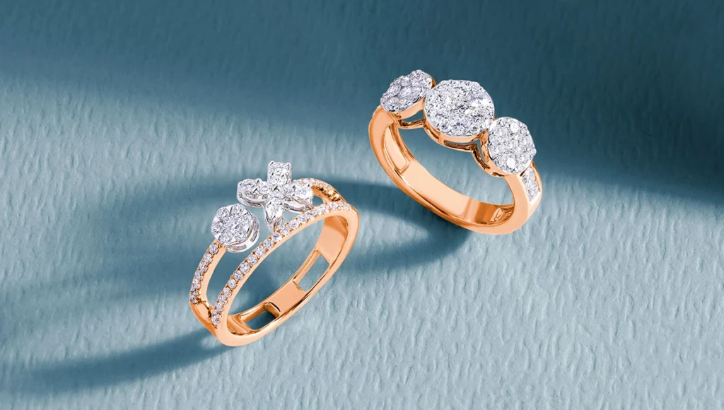 Two elegant diamond rings featuring sparkling white diamonds, showcased in a refined jewelry photography setting.