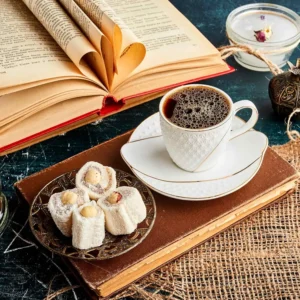 coffee cup with open books